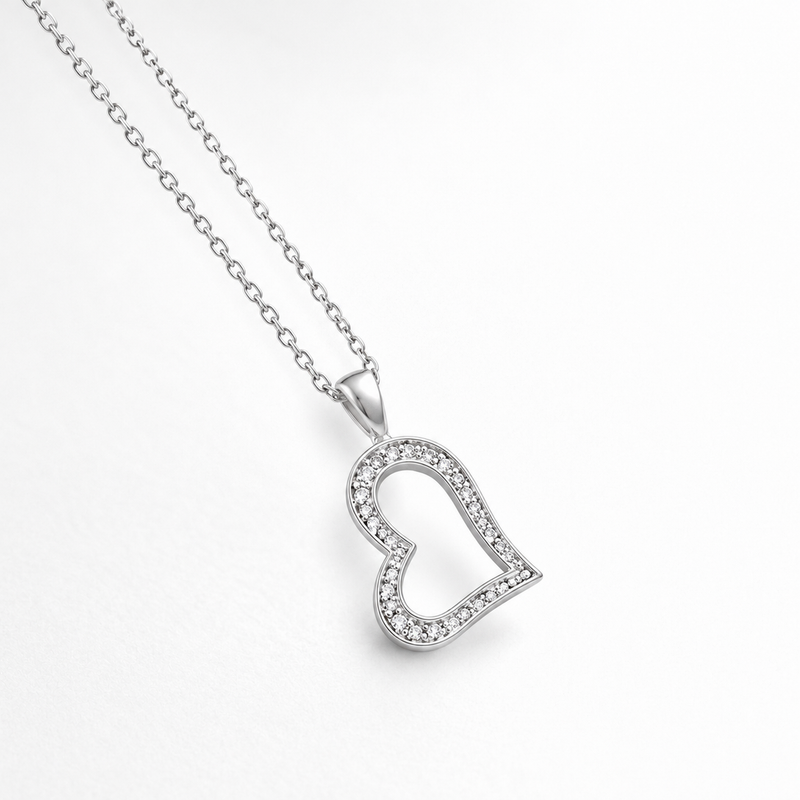Asymmetric Heart Clear Stone Pendant in Silver Tone, angled view.