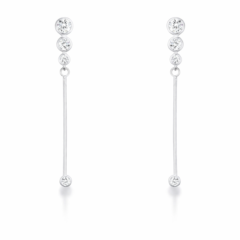Studio view of minimalist linear drop earrings featuring multiple cubic zirconia stones in a sleek design.