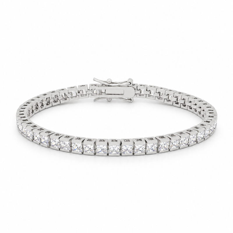 Full oval silver-tone tennis bracelet with clear square stones on white.