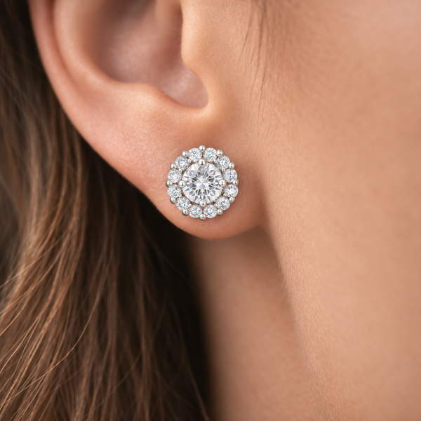Bella Halo CZ Stud Earrings in Silver Tone, worn on ear.
