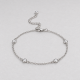 Clara Clear Station Bracelet in Silver Tone, studio view.