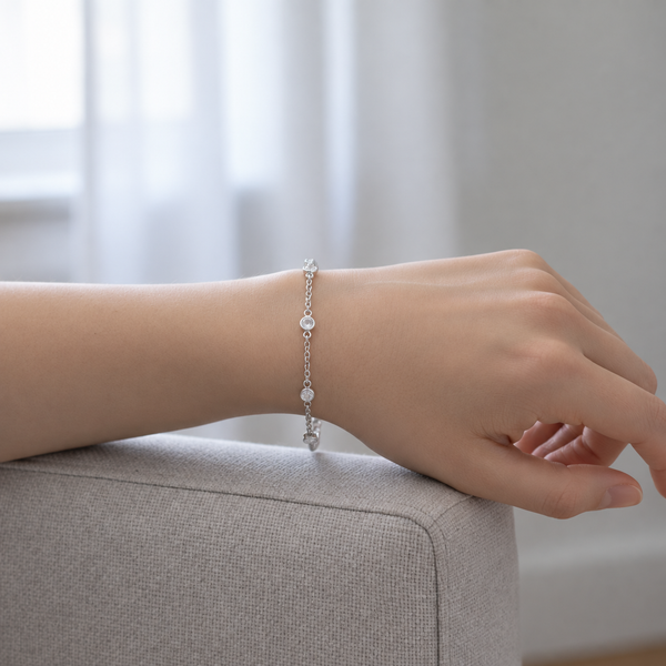 Clara Clear Station Bracelet in Silver Tone, worn on wrist.