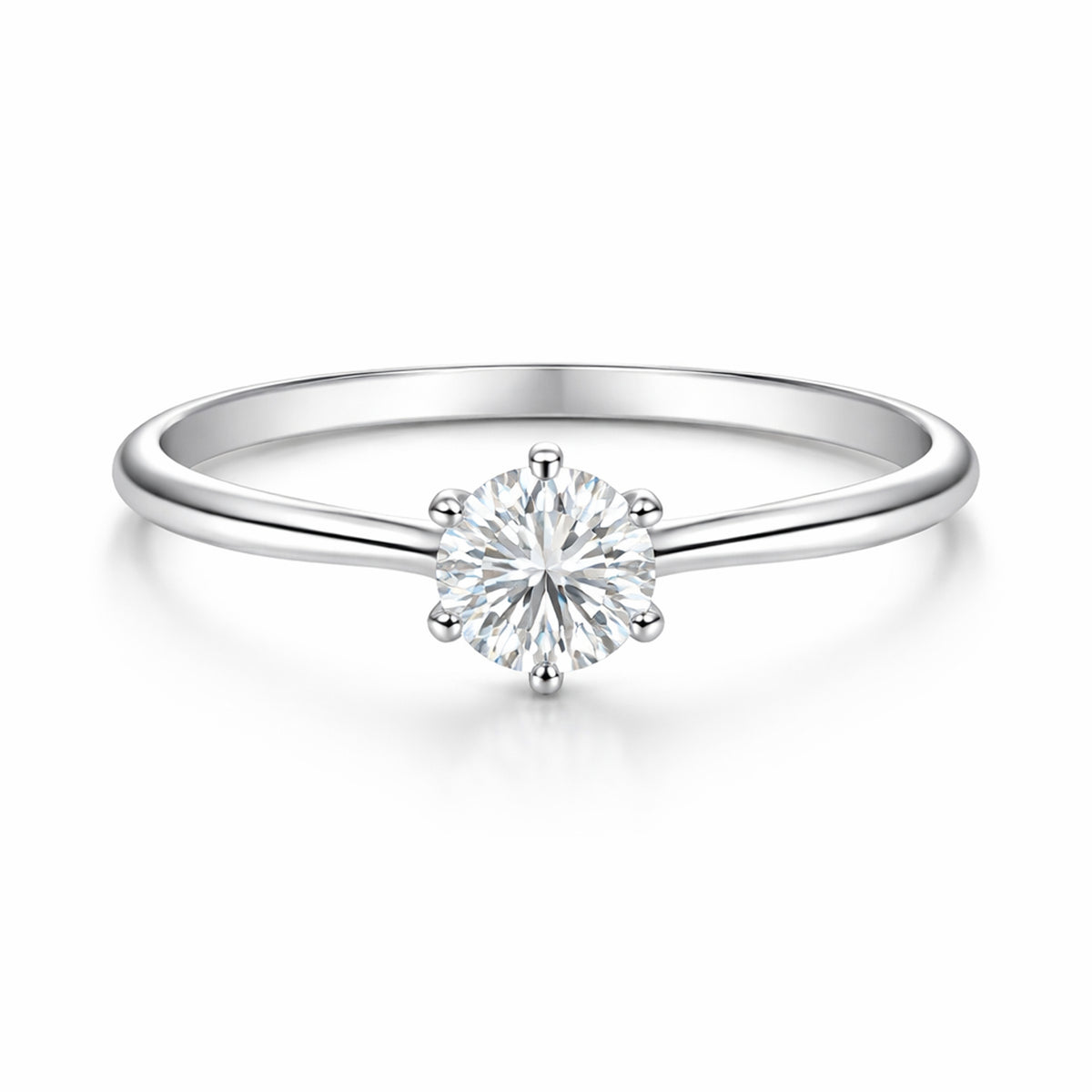 Studio view of the classic solitaire cubic zirconia ring in silver tone finish, centered on a clean background and featuring a round cut center stone in a prong setting.