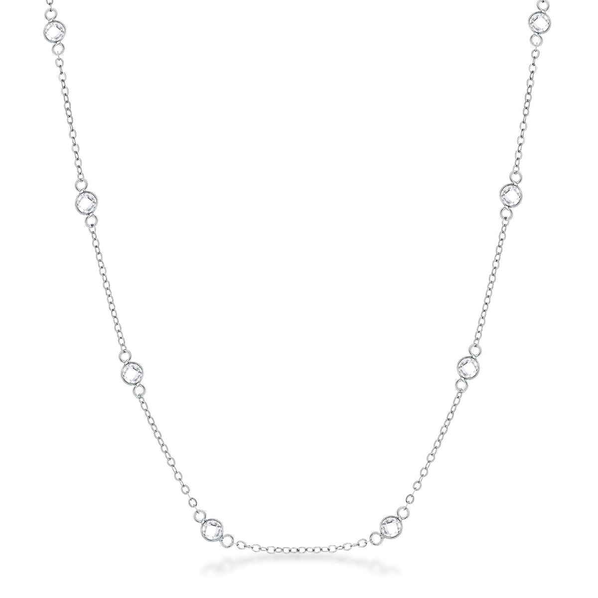 Front facing studio view of a silver tone station necklace featuring evenly spaced bezel set stones along a delicate chain.