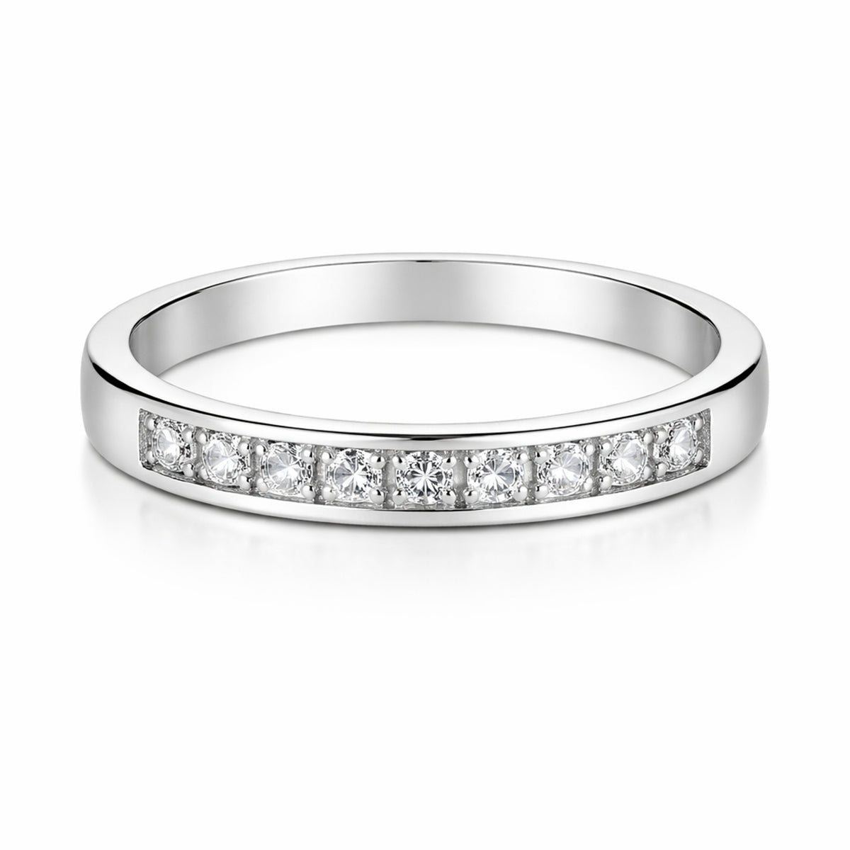 Studio view of a slim Silver Tone band featuring a channel set row of small cubic zirconia stones across the front section.