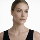 Model view showcases a silver tone double heart cubic zirconia pendant, styled with a sleek black top so the pendant stays centered at the neckline.