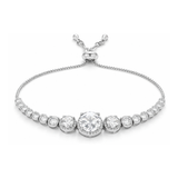 Studio view of an halo slider bracelet with a central round cubic zirconia stone surrounded by smaller stones and a fine chain in silver tone.