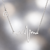 Heartbeat and Heart Necklace in Silver Tone, center stone detail.