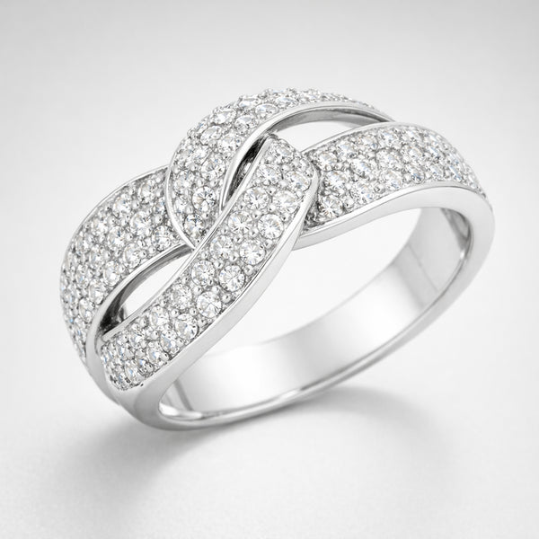 Angled view of the infinity pavé cubic zirconia ring highlighting the crossing design and continuous pavé setting.