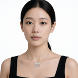 Interlocking Floral CZ Necklace in Silver Tone, model shot.