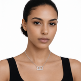 Interlocking Floral CZ Necklace in Silver Tone, on model.
