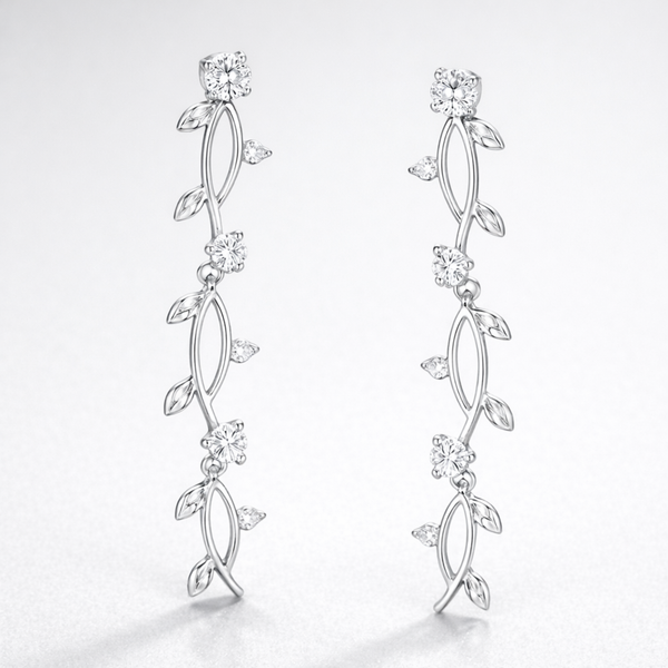 Studio view of the leaf motif drop earrings with elongated design and sparkling cubic zirconia accents.