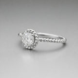Angled view of the rope style solitaire cubic zirconia ring showing the raised solitaire setting and twisted shank design.