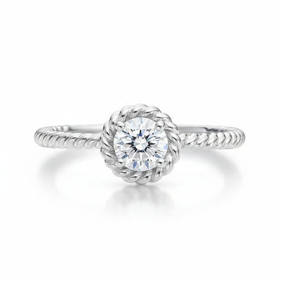 Studio view of the rope style solitaire cubic zirconia ring in silver tone finish, shown centered on a clean background.
