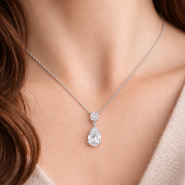 Round and Pear Clear Stone Drop Pendant in Silver Tone, worn view.